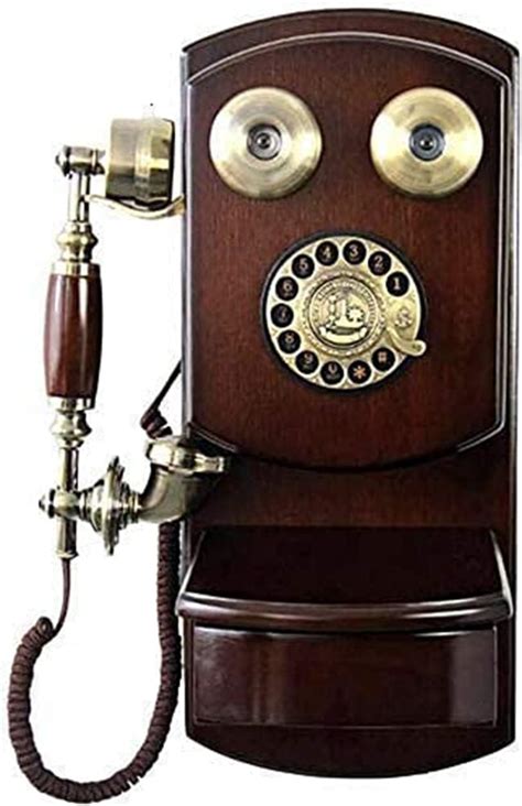 trunk line telephone|old fashioned wall phones.